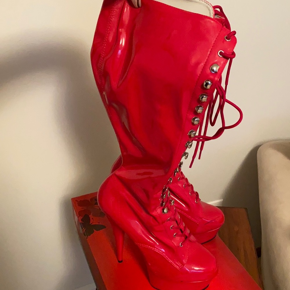 Costume boots. Worn once. Red is the color of the season!